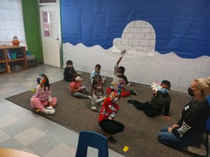 Children learning and participating in class